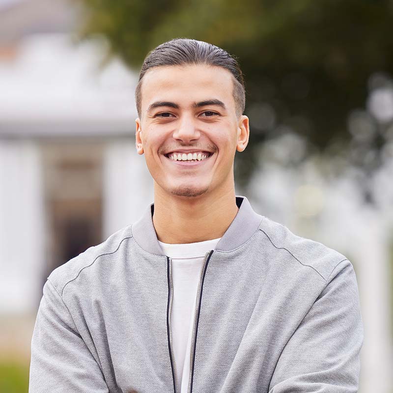 education smile and college with portrait of man A7C296T nella pagina Sentire